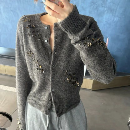 Fashion Style:Autumn/Winter Trendy  Pattern Type Beading &ampSequins  MaterialWool  Neckline: Round Neck  Fit TypeCardigan Sweater